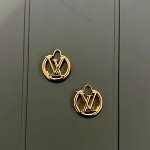Gold small LV earrings. Very good condition.